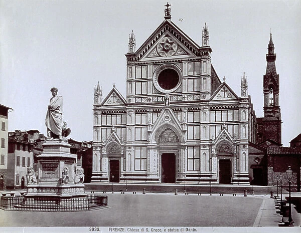 The facade of the Church of Santa Croce in Florence with the statue of Dante at the center of the square