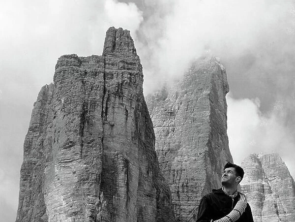 Mountain climber in front of the Three Peaks of Lavaredo