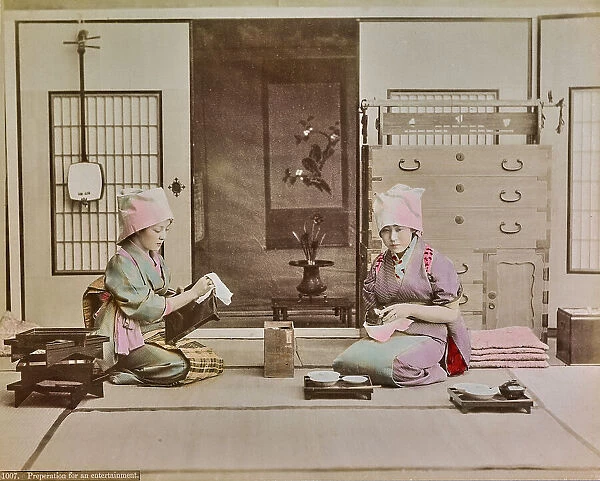 Two women prepare a reception, Japan