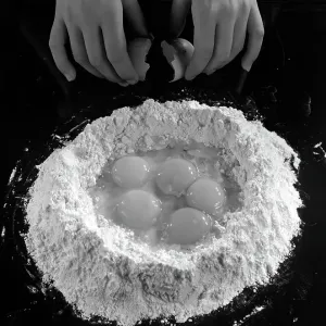 Dough processing: flour and egg yolks; advertising image of the Bodonian Lithograph