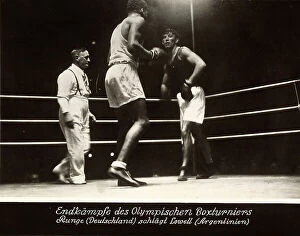 Images Dated 12th June 2008: 1936 Berlin Olympic Games: final boxing round between Runge (Germany) and Lowel (Argentina)