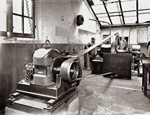 Images Dated 10th March 2011: Barbera Print Shop: two workers working on a machine
