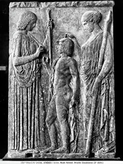 Images Dated 11th April 2012: The bas-relief shows the three Elesuine divinities: Work on display at the National Museum of Athens