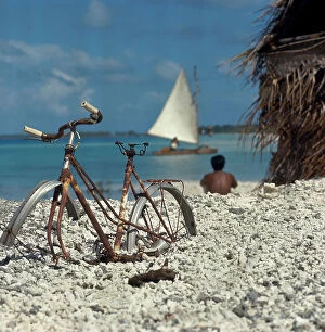 Images Dated 21st February 2008: Bicycle eaten away by the sun on a Maldives beach