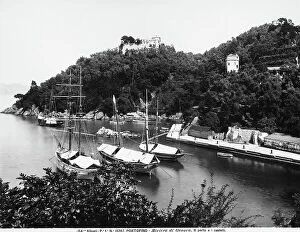Images Dated 8th May 2007: Boats anchored in the port of Portofino, located near Genoa. The castles can be seen on the hill
