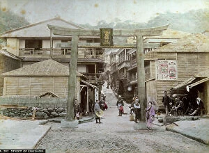 Japan: A busy street in Enoshima, in Japan, flanked by humble buildings