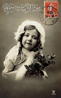Images Dated 18th September 2007: Child female portrait on a new year greeting post-card, with a Heureuse Anne inscription