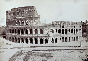 Images Dated 3rd April 2012: The Colosseum in Rome. In the foreground, a part of the road which circles it