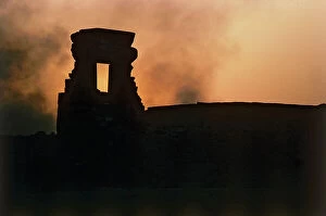 Images Dated 15th November 2011: Dandara. The fireball of the sun setting over the ruins of the Temple of Hathor