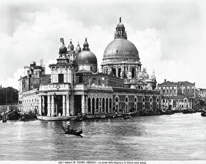 Images Dated 28th August 2006: The Dogana da Mar building, or Customs House, and the church of Santa Maria della Salute in Venice