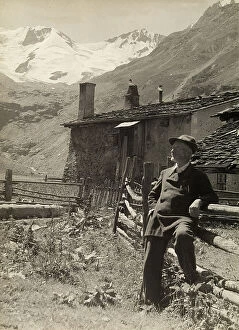 Images Dated 5th May 2011: Elderly man with mountainous landscape