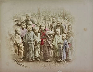 Japan: Two elderly women with a group of children, Japan