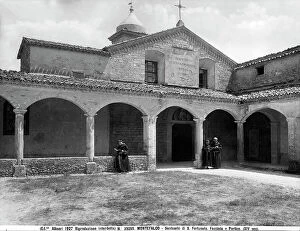 Images Dated 26th July 2010: Faade and portico of the church of S. Fortunato with friars reading. Montefalco, Perugia