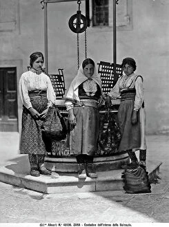 Images Dated 10th April 2012: Three farmers from Dalmazia, in traditional costume in front of a well, Zara