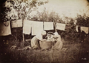 Images Dated 12th April 2012: Two farmwomen wash and hang out the linens to dry; Europe