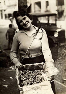 Images Dated 4th August 2010: Female grape vendor at the Turin market