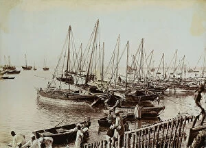Images Dated 4th April 2011: Fishermen and their boats docked in the port of Stone Town on the island of Zanzibar, Tanzania