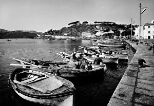 Images Dated 16th July 2009: Fishermen moored at the quay of the port of Porto Azzurro on Elba Island