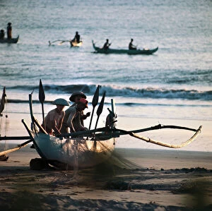Images Dated 13th June 2008: Fishermen and outrigger canoes on the shore of Sulawesi, Indonesia