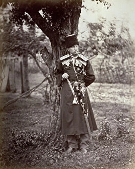 Images Dated 27th October 2011: Full-length portrait of a Cossack in his typical uniform. He has numerous medals on his chest