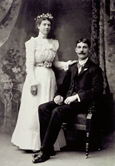 Images Dated 23rd November 2009: Full-length portrait of a young bride and groom. She is standing
