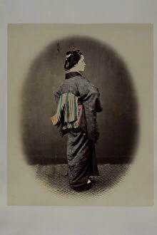 Images Dated 24th November 2010: Full-length portrait of a young japanese lady. She is seen from the back, her face in profile