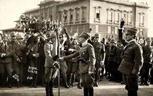 Images Dated 11th May 2011: Gabriele D'Annunzio gives a flag to a soldier, as a sign of greeting