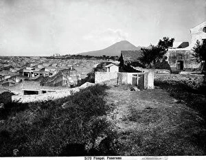 Images Dated 10th January 2011: General view of the excavations of Pompeii, with Vesuvius erupting in the background