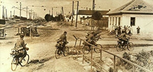 Images Dated 27th October 2011: German cyclists enter the city of Voroshilovgrad during WWII