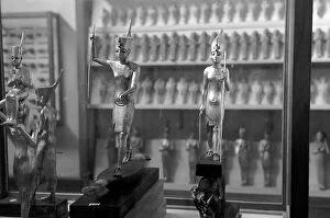 Images Dated 9th September 2011: Gilded wooden statues of the boy-king Tutankhamon previously stored at the Egyptian Museum of
