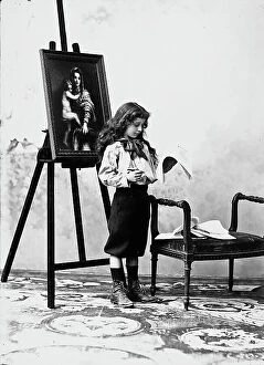 Images Dated 23rd March 2011: Girl in nineteenth century costume portrayed next to a picture