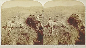Images Dated 8th November 2011: Greek shepherd in traditional clothing with his flock of sheep at pasture on a bare terrain with