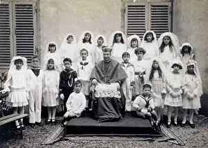 Images Dated 8th November 2010: Group of children, in first communion attire, shown with the bishop. The boys wear sailor outfits
