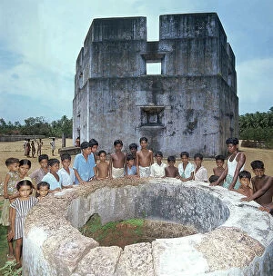 Images Dated 31st May 2007: Group of children among the ruins of Portuguese forts from the sixteenth