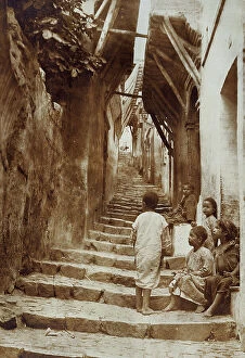 Images Dated 28th April 2011: Group of children sitting on a stairway, Algeria