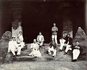 Images Dated 25th March 2011: Group of people sitting in front of the entrance to the 'Elephanta'
