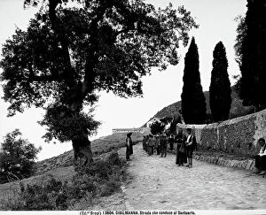 Images Dated 31st October 2008: A group of people walking along the road leading to the Santa Maria Sanctuary in Gibilmanna