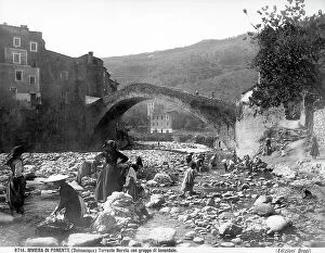 Images Dated 11th December 2006: A group of washerwomen near the stream of Bervio in the town of Dolceacqua