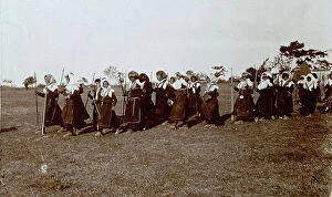 Images Dated 4th March 2010: Group of women, in working class clothes, in procession on a lawn holding small crosses in their