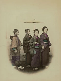 Japan: Group of young Japanese women with a boy