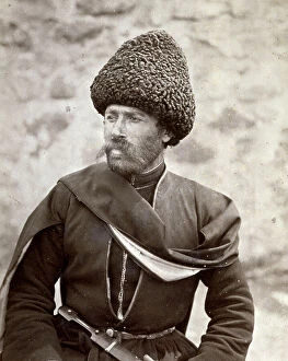 Images Dated 16th May 2011: Half-length portrait of an Armenian man. He is wearing a large lambskin hat
