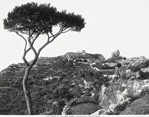 Images Dated 11th April 2005: A hill on the island of Capri, in Campania, with the villa of emperor Tiberius in the distance