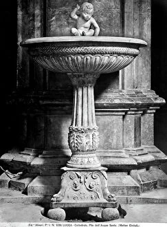 Images Dated 18th April 2012: Holy-water font with the statue of a putto preserved in the Cathedral of S.Martino, Lucca