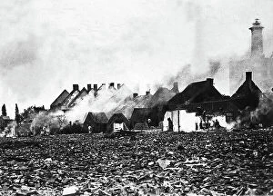 Images Dated 16th November 2011: Some houses on fire, in Antewerp's outskirts, after the fall of the city under the German fire