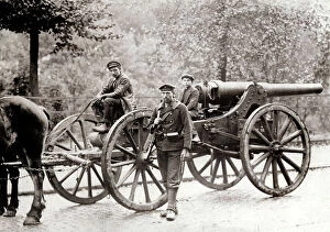 Images Dated 19th March 2009: The image shows two men and a boy, forced to pull the German cannons to Antwerp