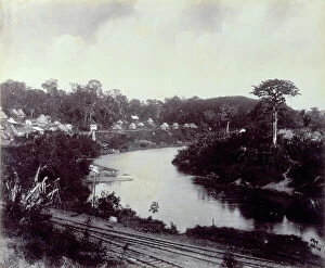Images Dated 2nd November 2011: An Indian village in the hinterland of Panama. In the foreground a stretch of the railroad which