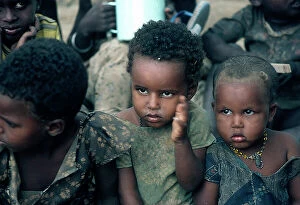 Images Dated 10th November 2009: Jalalaxi: in the Ogaden refugee camp, faces of children during an emergency meal