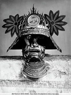 Images Dated 25th September 2009: Japanese helmet with visor of wrought iron; work housed at the Stibbert Museum, Florence