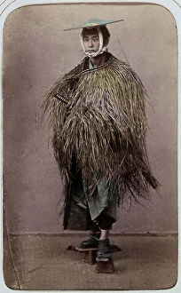 Japan: Japanese man in a straw outfit