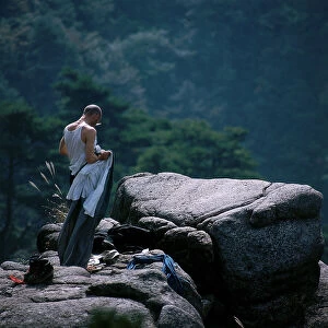 Japan: Kobe. Mountaineering monk amongst the woods and rocks to the north of Kobe